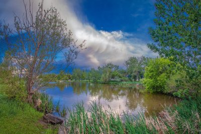 Surreal feel, Kinsmen Lake and departing storm, Strathmore, AB, 2026-06-16