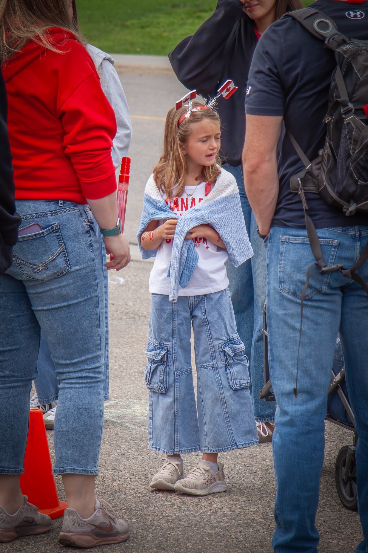 Young girl about to break into tears on Canada Day.